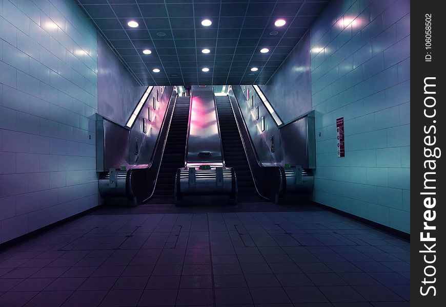 Landscape Photo Of Two Escalators