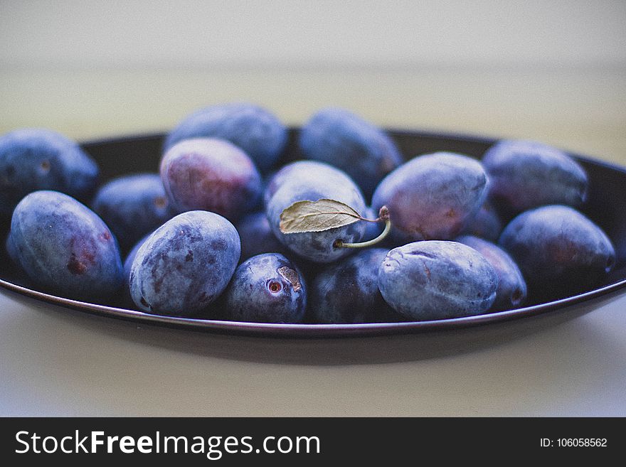 Black Berries on Top of Black Ceramic Plate