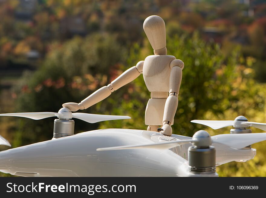 The AI serviceman doll is working on his drone. Checking and testing reliability of propellers before flying. The AI serviceman doll is working on his drone. Checking and testing reliability of propellers before flying.