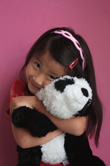 Little Chinese Girl With Panda Bear Royalty Free Stock Image