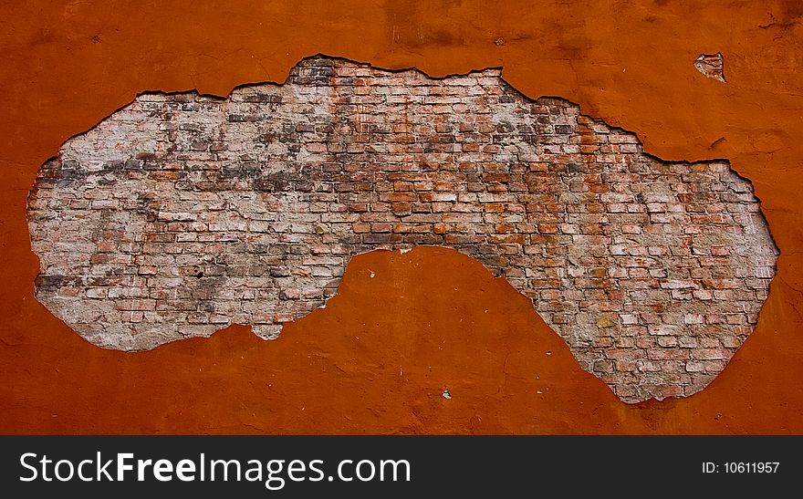 Old weathered grunge brick wall in the frame