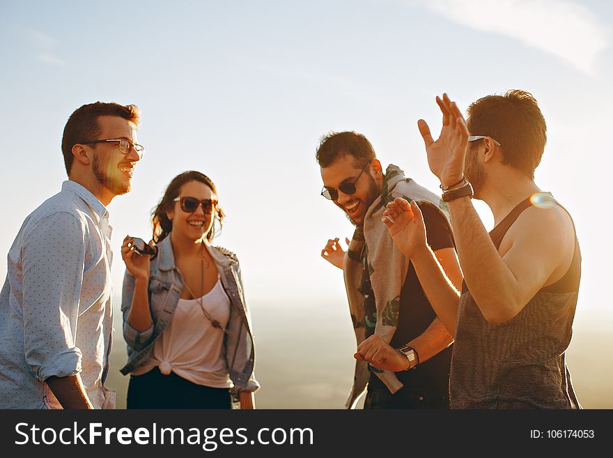 Group of People Having Fun Together Under the Sun