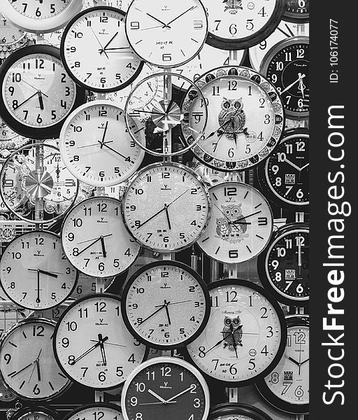 Black And White Photo Of Clocks