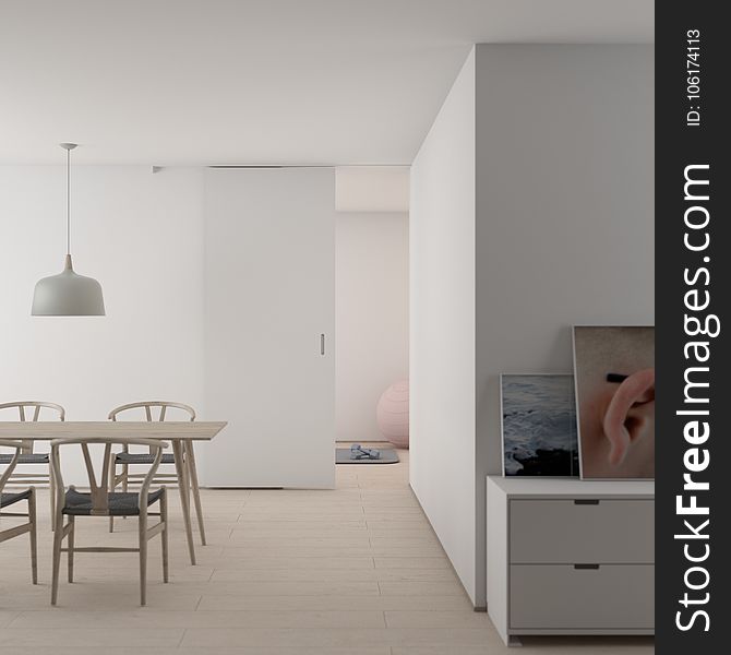 Person Taking Photo Of Gray Pendant Lamp Over Brown Wooden Dining Table Indoor