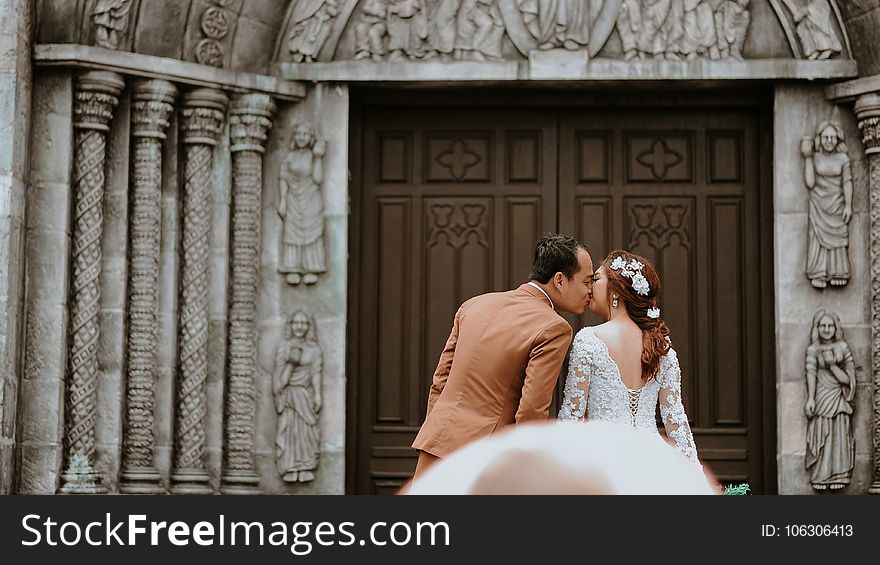 Couple Near On Wooden Sash Door