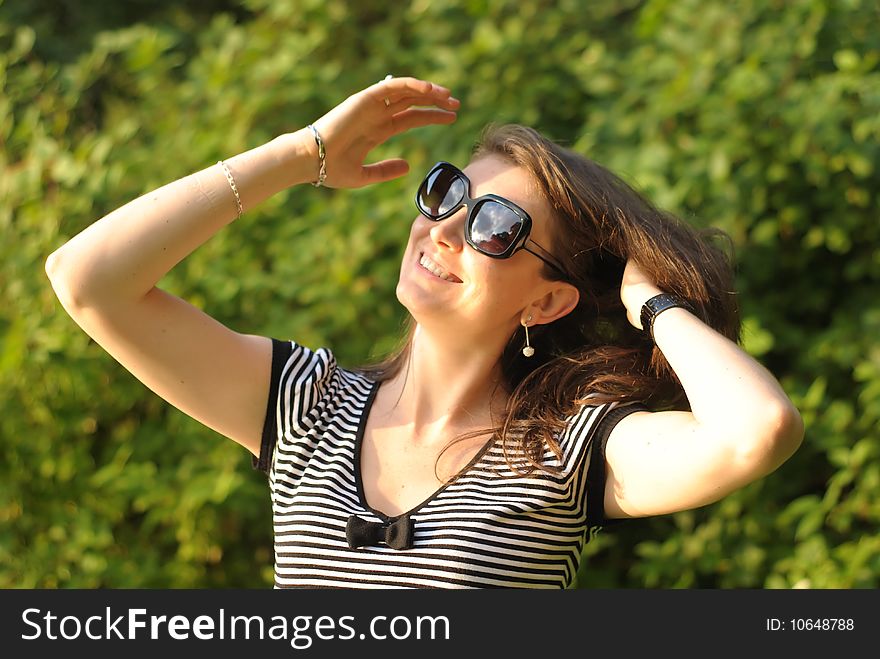 Woman Arranging Hair