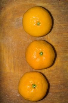 Orange On A Cutting Board Royalty Free Stock Photo Orange On A Cutting Board Royalty Free Stock Photo
