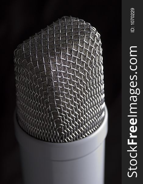 Low key microphone black background