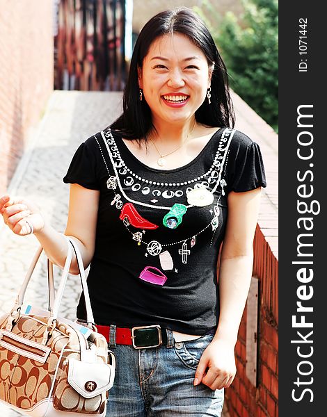 Portrait of a Korean woman on a shopping trip. Portrait of a Korean woman on a shopping trip