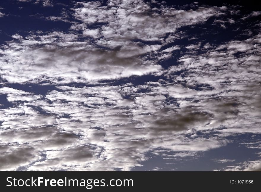 Clouds On Blue Sky Background