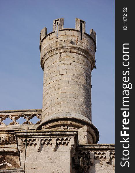 Low-angle shot of a round medieval tower. Low-angle shot of a round medieval tower.