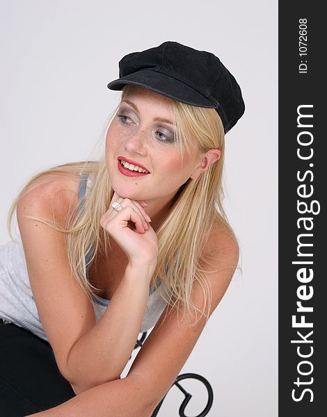 Beautiful blond girl with black hat. Beautiful blond girl with black hat