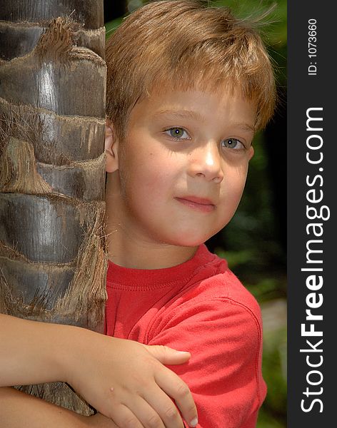 Young child portrait photographed outdoors. Young child portrait photographed outdoors