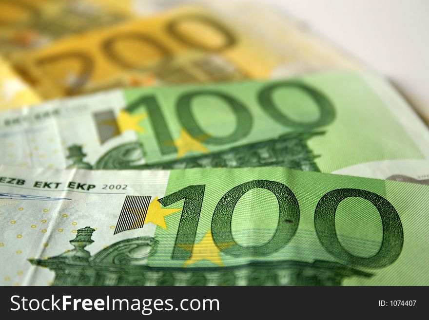 Closeup of euro banknotes isolated over white background. Closeup of euro banknotes isolated over white background