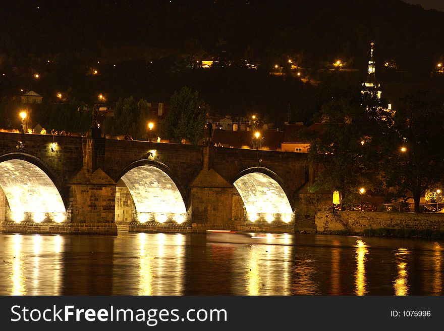 Charles bridge at night - mysterious scene in old prague city