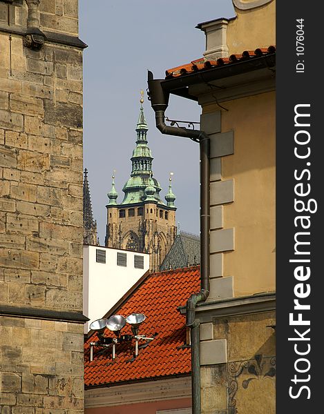 Red Tile roofs and a church tower  in Prague old city. Red Tile roofs and a church tower  in Prague old city