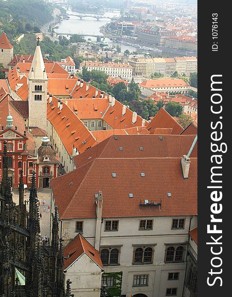 Prague tile roofs and river view