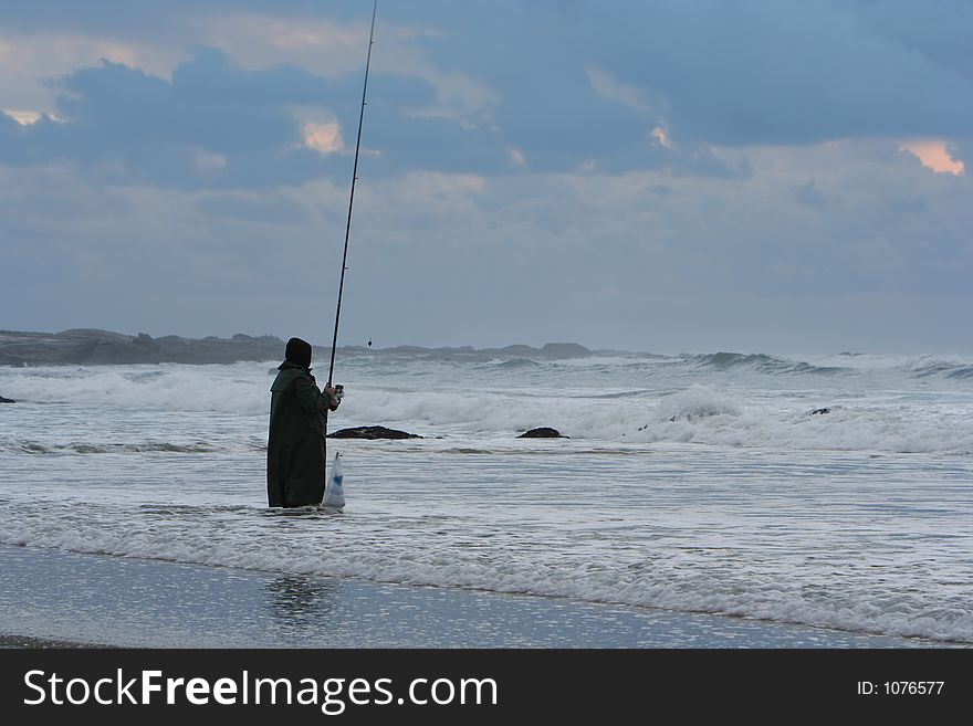 Fisherman in the sea