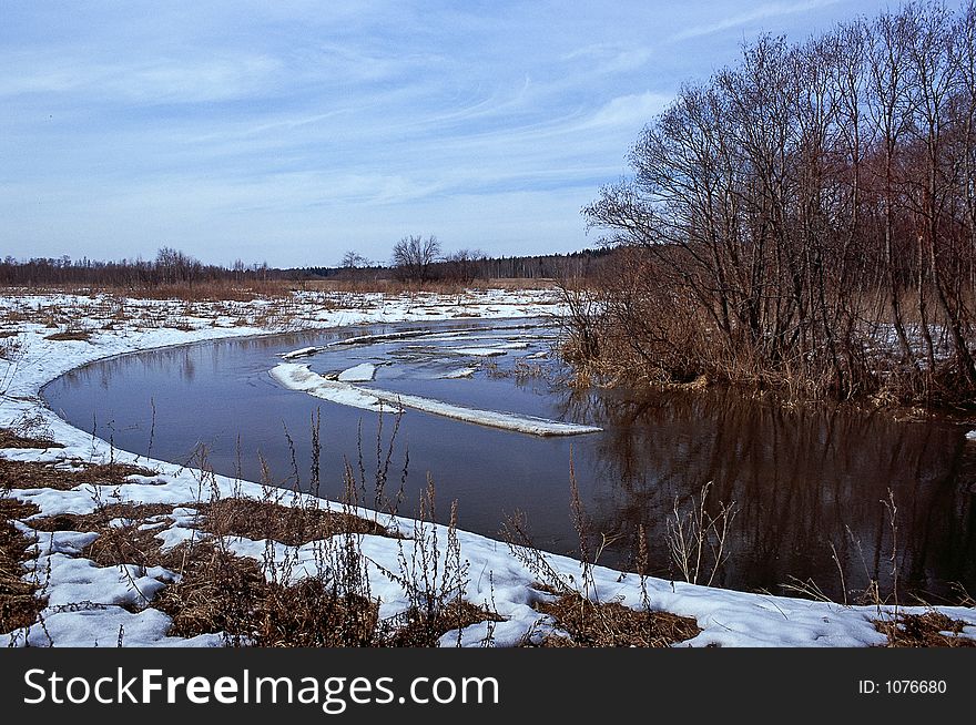 melting ice on a plains river in early march.
. melting ice on a plains river in early march.
