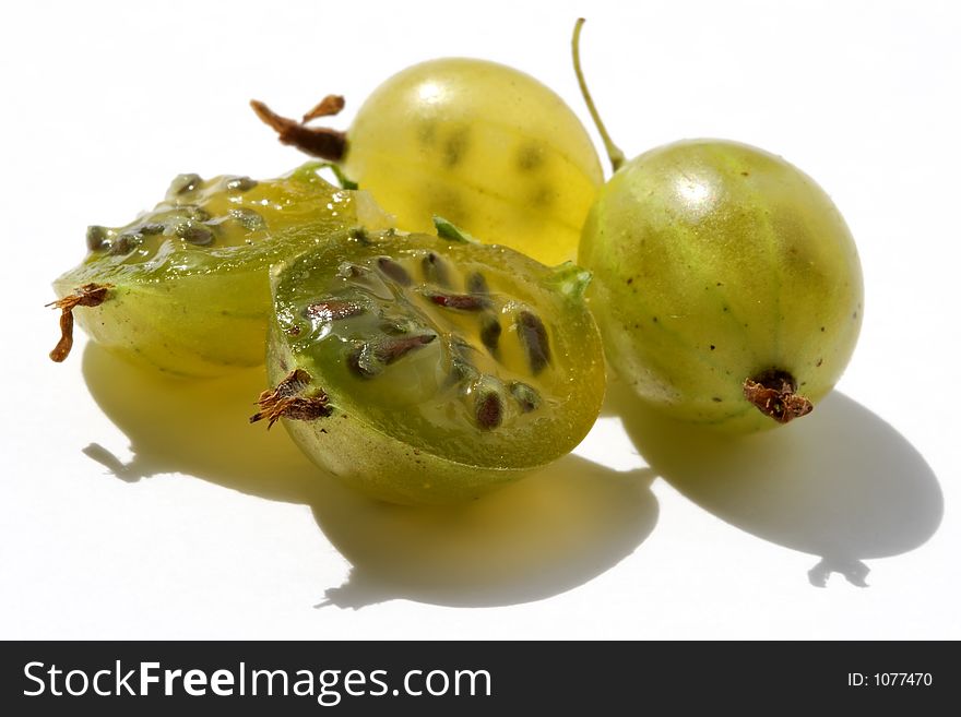 Juicy berries of a gooseberry are shone on the sun. Juicy berries of a gooseberry are shone on the sun