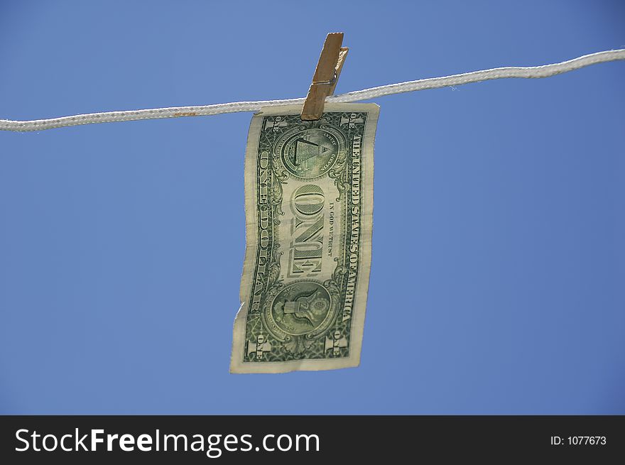 Dollar Hanging on a Clothesline. Dollar Hanging on a Clothesline