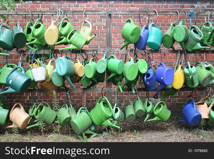 Watering cans hanging around. Watering cans hanging around