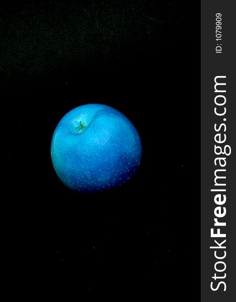 Blue apple / shot taken in studio with digital filter