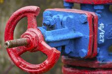 Steam Pipe Valve In Red And Blue Colors Royalty Free Stock Photos