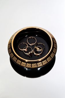 Greek Case With Golden Rings Stock Photography