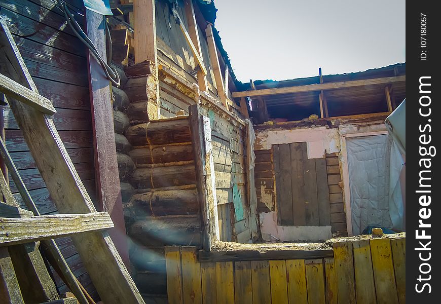 Old house made of wood destroyed, broken. Old house made of wood destroyed, broken.