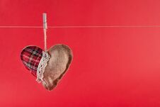 Heart Hangs On Rope Isolated On Red Background And Space For Text Royalty Free Stock Photos Heart Hangs On Rope Isolated On Red Background And Space For Text Royalty Free Stock Photos
