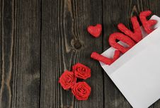 Word LOVE On Wooden Background. Concept Of Valentine`s Day. Stock Photo Word LOVE On Wooden Background. Concept Of Valentine`s Day. Stock Photo