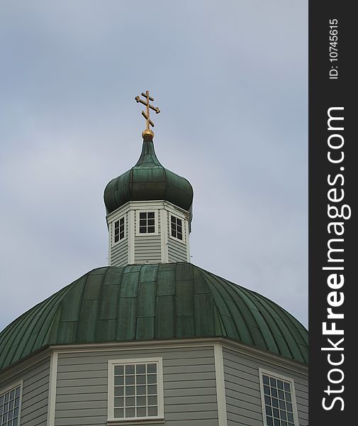 Dome and cross of historic Saint Michaels Russian Orthodox Cathedral at Sitka Alaska. Dome and cross of historic Saint Michaels Russian Orthodox Cathedral at Sitka Alaska.