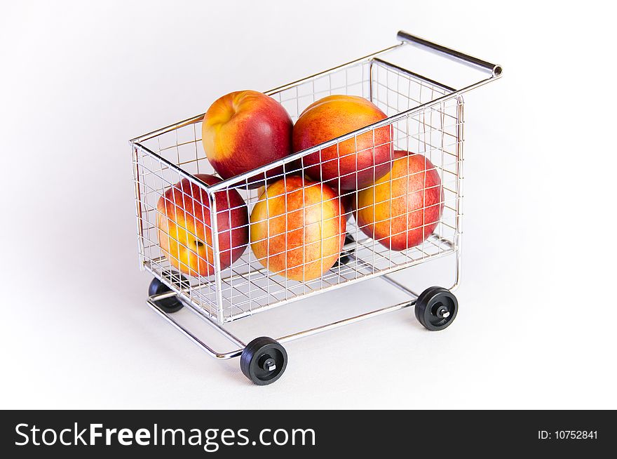 Mini sopping cart with fruits. Mini sopping cart with fruits