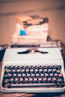 Typewriter Antique Vintage Style With Old Documents Or Old Letter And Books For Writer On Wooden Desk Zoom In Front View Stock Photography