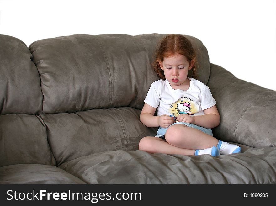 Girl sitting on couch. Girl sitting on couch