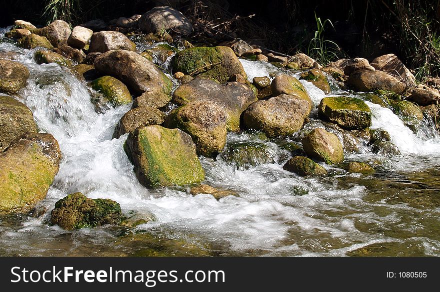 Panoramic view of a mountain river rapids. Panoramic view of a mountain river rapids