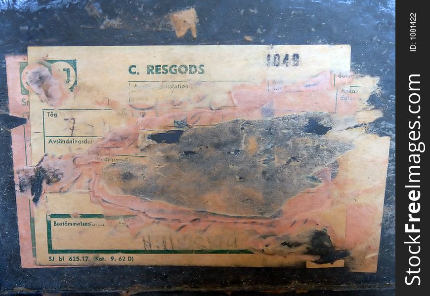 A worn military decal on a Swedish Army issue trunk. A worn military decal on a Swedish Army issue trunk.
