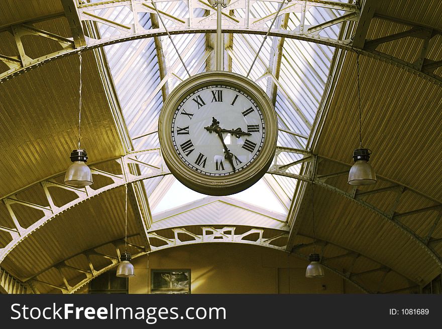 Big hanging clocks in a railroad station hall, Vitebsk Railroad Station, Saint Petersburg, Russia.