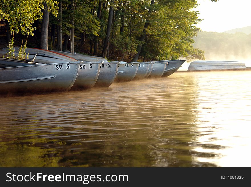 Lake view and row boats in the early morning. Lake view and row boats in the early morning