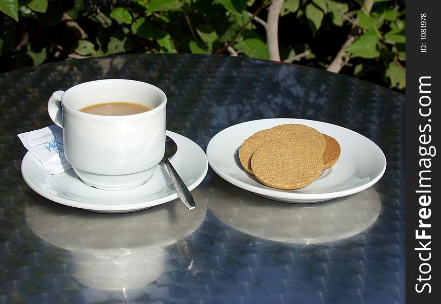 Coffee cup whit biscuits