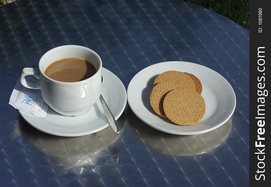 Coffee cup whit biscuits