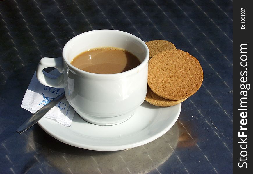 Coffee cup whit biscuits