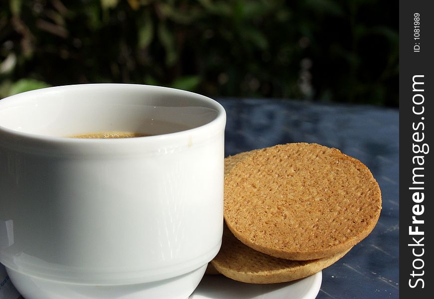 Coffee cup whit biscuits