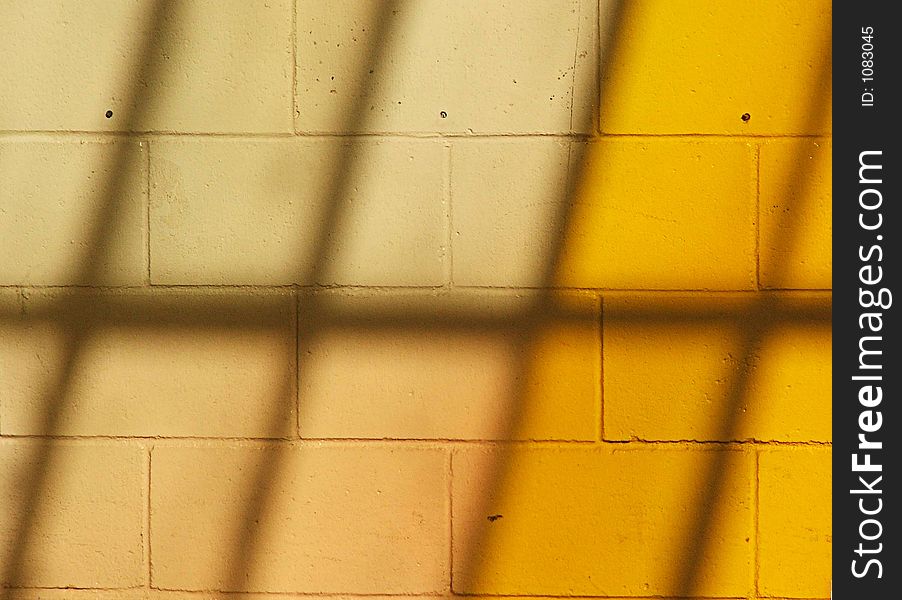 Shadows reflecten on concrete block wall