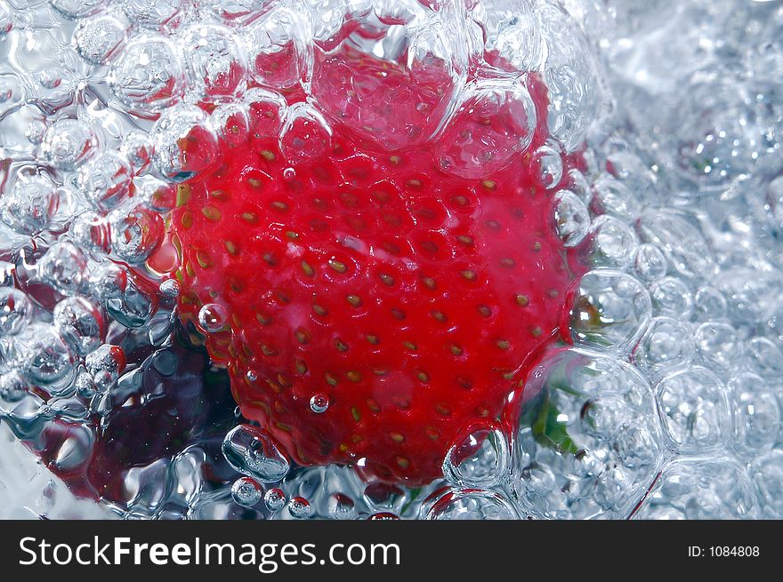 Fresh strawberry in cold water. Fresh strawberry in cold water