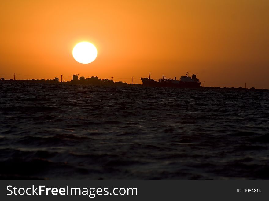 Sea Sunrise and boat silhouette. Sea Sunrise and boat silhouette