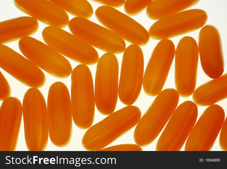 Group of yellow or orange pills. Group of yellow or orange pills