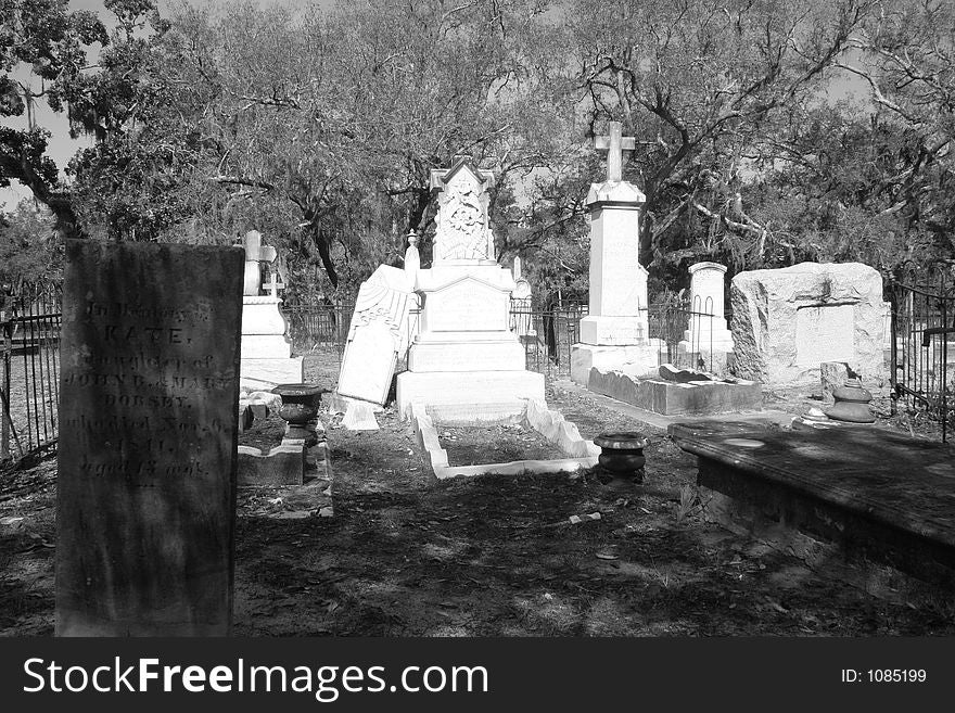 Old graves with broken headstones