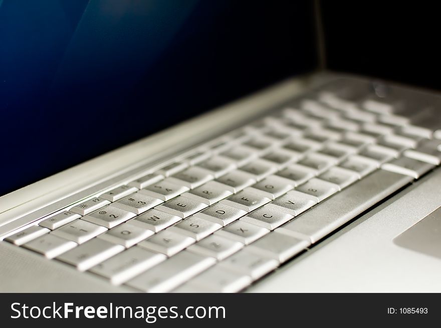 Laptop Keyboard with blue lcd screen
Shallow Depth of field